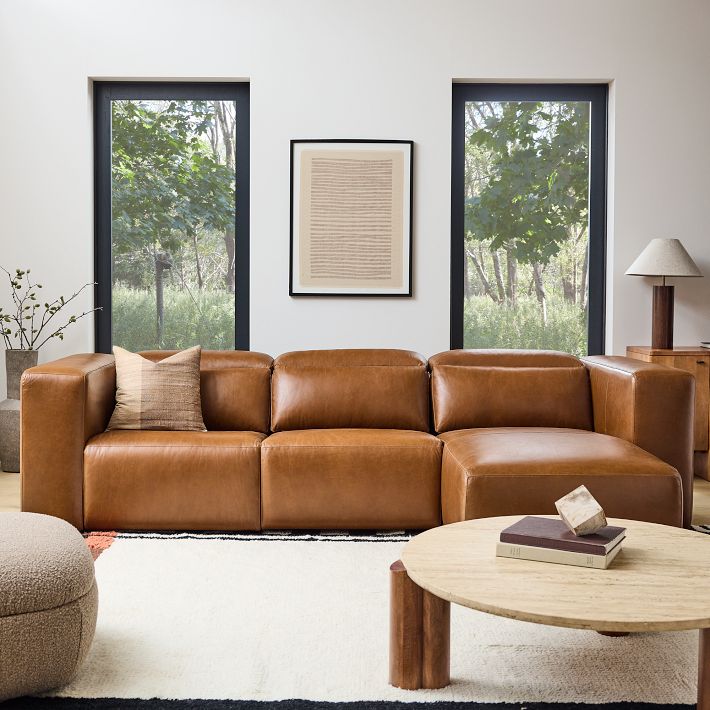 Leo Motion Reclining Leather 3-Piece Reversible Chaise Sectional (125&quot;)