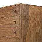 Front and side view of a wooden dresser with four drawers and round knobs.