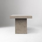 Single concrete pedestal table leg with top, isolated on white