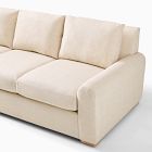 Close-up of beige sofa cushions and armrest