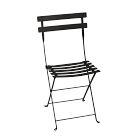 A black metal folding chair with slatted seat and backrest