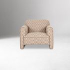 Small beige woven armchair, centered, against gray backdrop.