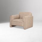 Small beige woven armchair placed against a gray background, full view.
