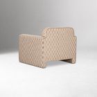 Three-quarter rear-left view of a beige woven armchair, showing armrest and seat.