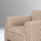 Close-up of the left arm of a beige woven armchair with textured pattern.