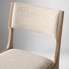 Close-up of beige fabric on chair back
