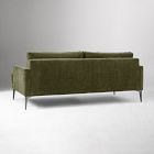 Back view of olive green sofa with visible legs