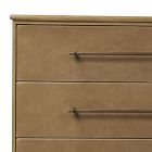 Close-up of a single drawer front with a metal handle.