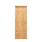 A single wide wooden panel or tall drawer front in light wood