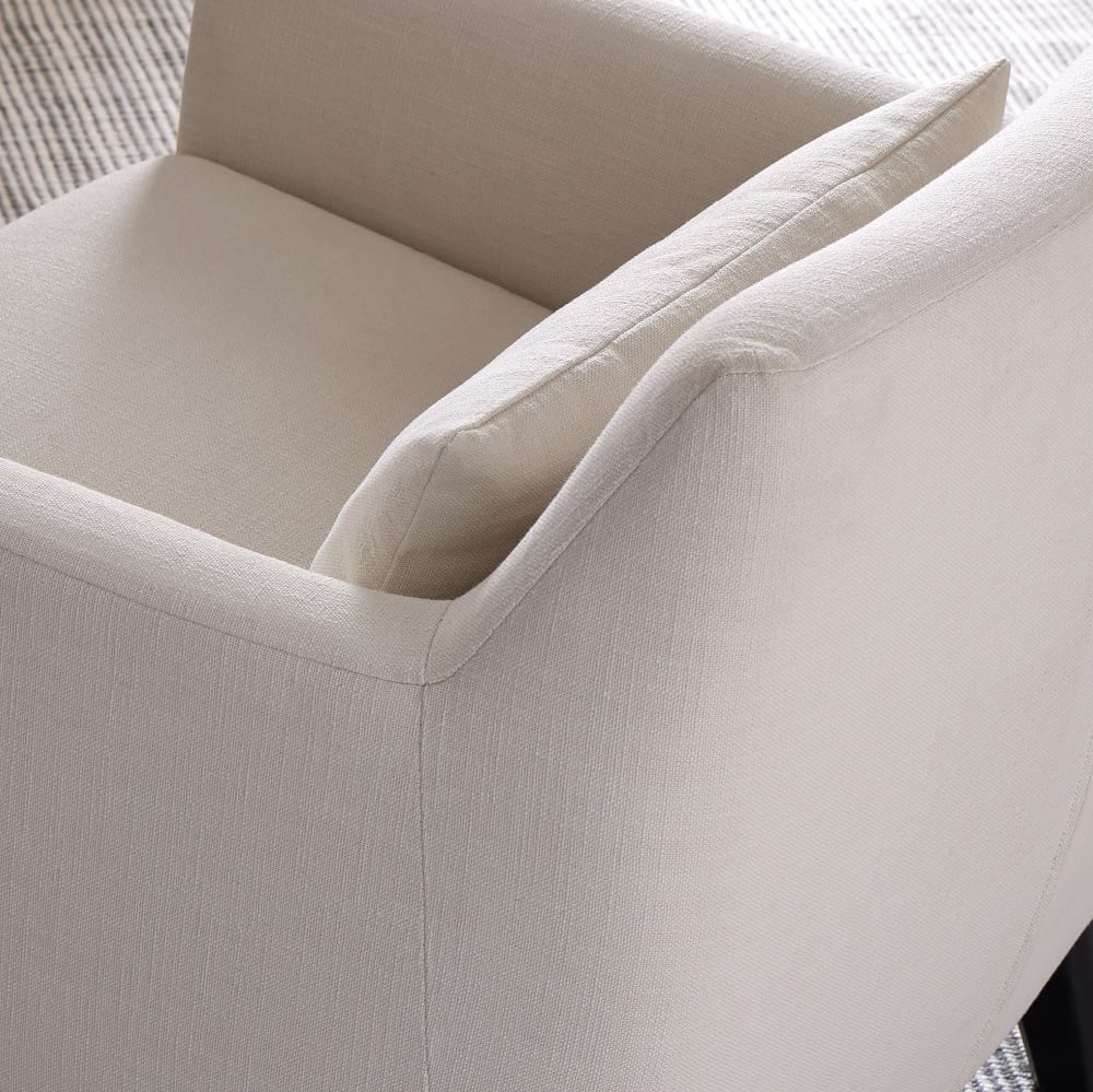 Top view of chair side with cushion and arm
