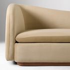 Close-up of sofa arm and base showing upholstery and stitching