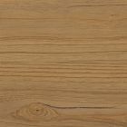 Close-up of wood grain with circular growth ring and light to medium brown wood tone