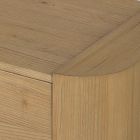 Corner and edge connection of wooden drawers showing dovetail-like joints and alignment