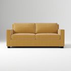 Bright mustard yellow sofa with clean lines in a studio setting