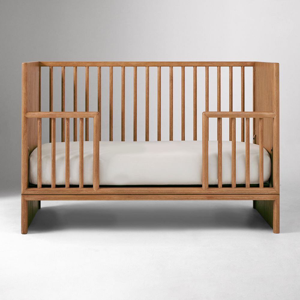 Front view of toddler bed configuration with rails