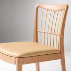Close-up of the chair back and cushioned seat.