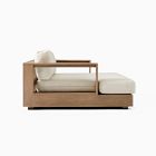 Wooden framed sofa with white cushions and extended seating area