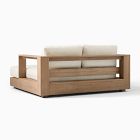 Wooden sofa with white cushions and open side armrests