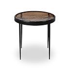 Round marble-topped side table with black frame and long slender legs