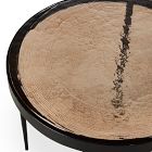 Close-up of round marble tabletop showing natural veining