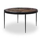 Round marble coffee table with long black legs