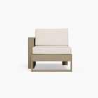 Single-seater ottoman-style chair with beige cushion and wooden base, front view.
