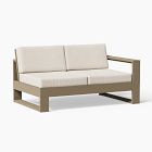 Beige cushioned sofa with wooden frame and a low-profile design, front view.