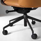 Office chair base and wheels viewed from front, orange seat visible