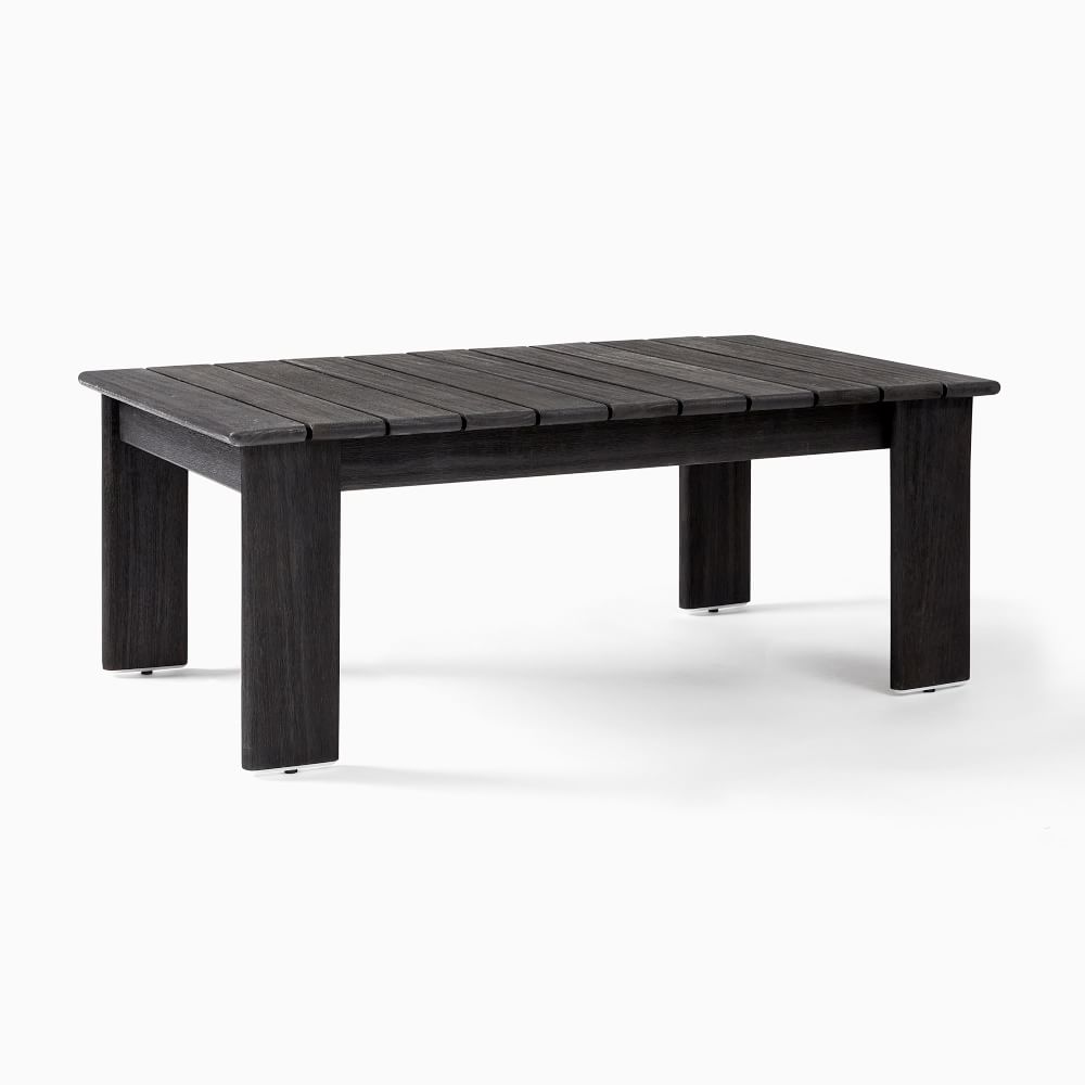 Dark wooden coffee table with slatted top.