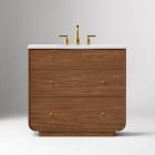 Front view of wooden bathroom vanity with two drawers visible, brass faucet above sink.