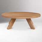 Round light wood coffee table with angled legs