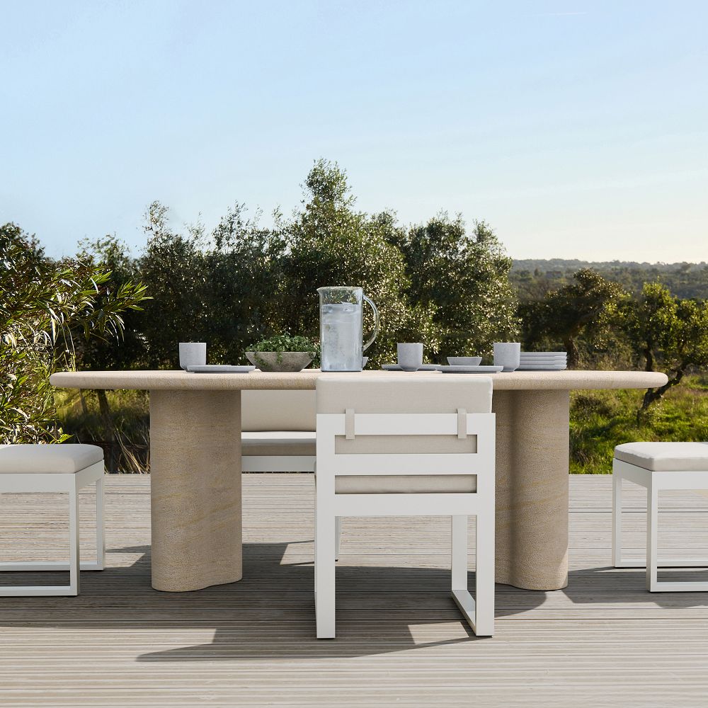 Menorca Faux Travertine Outdoor Oval Dining Table (86") by West Elm