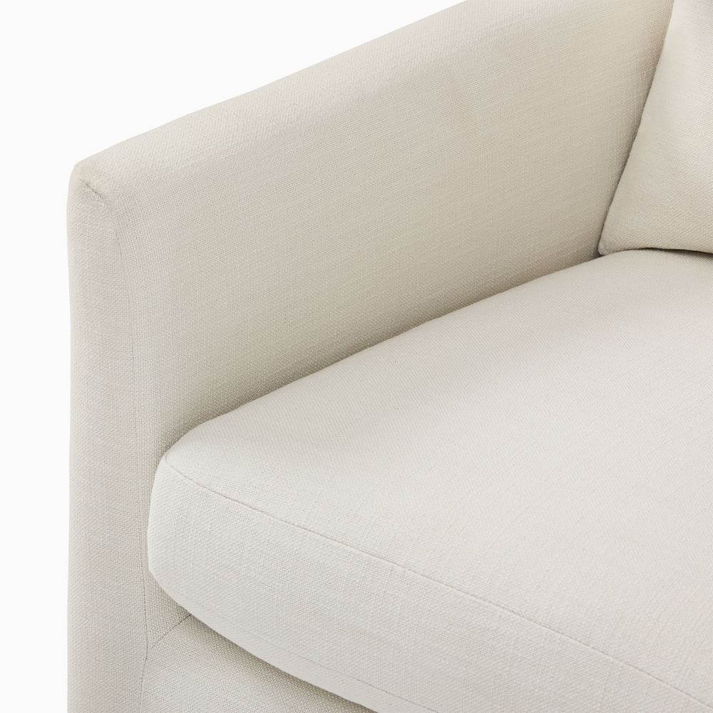 Close-up of top of arm with fabric and seam