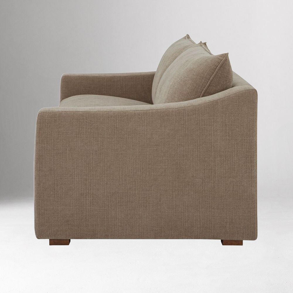 side view of tan sofa