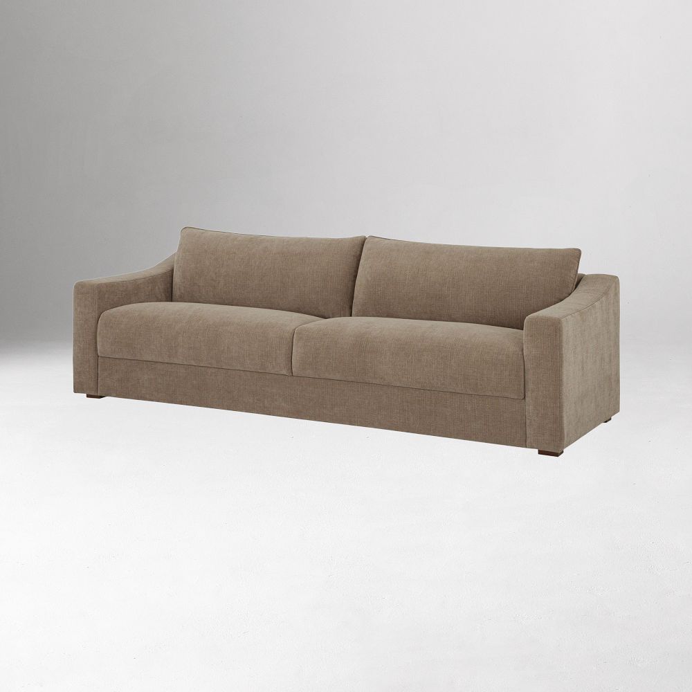 tan/beige sofa on white backdrop