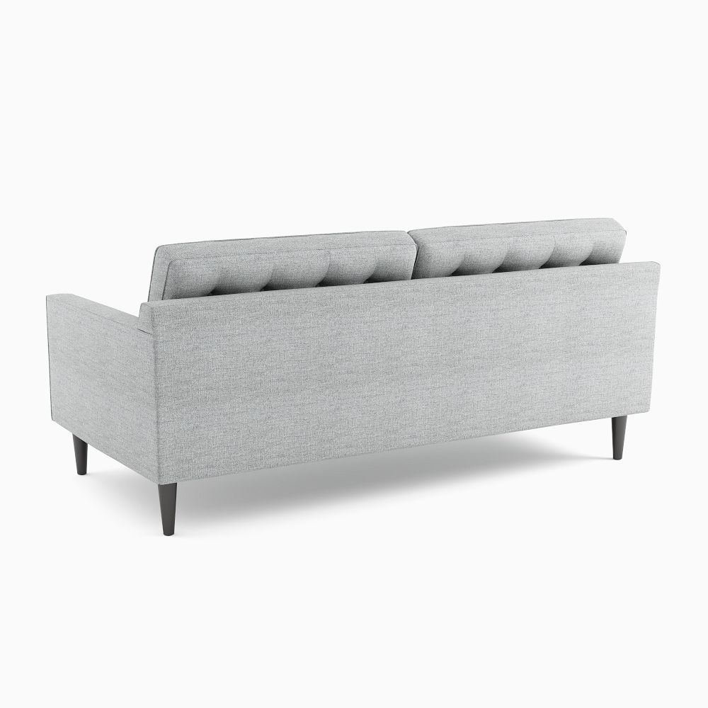 Back view of gray sofa showing exposed cushions