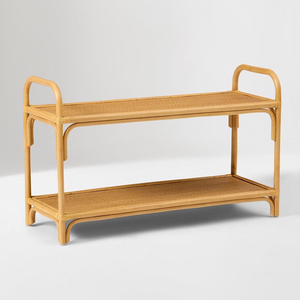 Side angle view of curved rattan small shelf