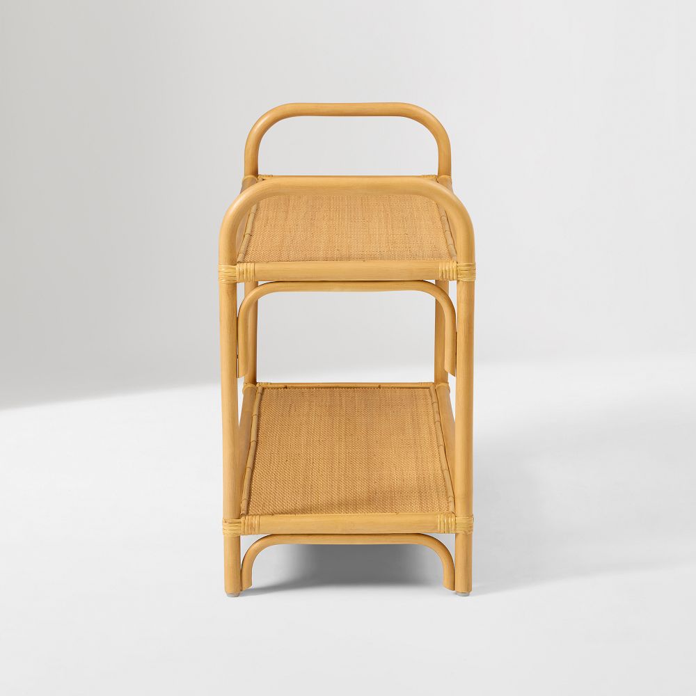 Front view of slim two-tier curved rattan shelf