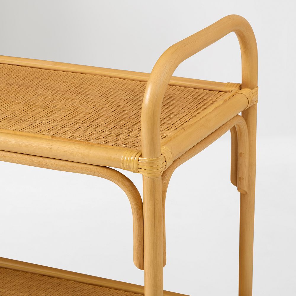 Top corner of curved rattan shelf