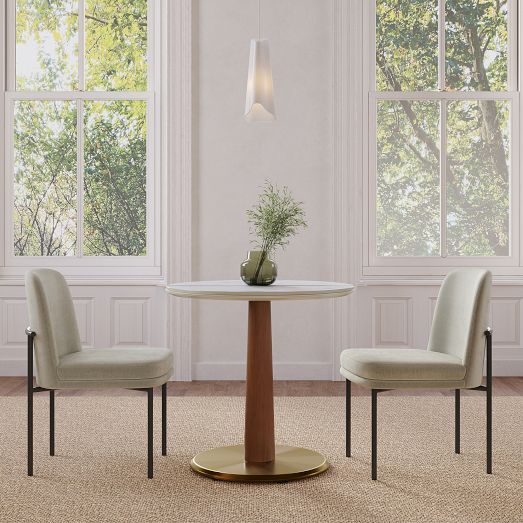 Claire Restaurant Dining Table - Porcelain w/ Protective Metal Bumper - Round by West Elm