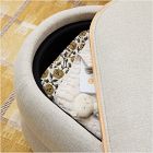 Lumi Upholstered Oval Storage Ottoman