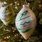 Painted Skier Glass Ornament - Green