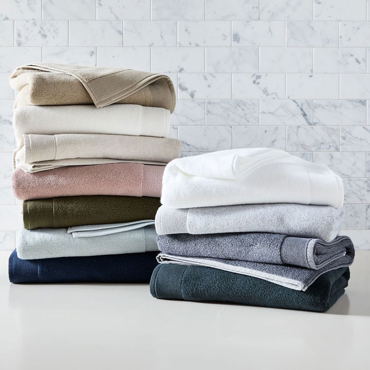 Stack of multicolored soft cotton towels
