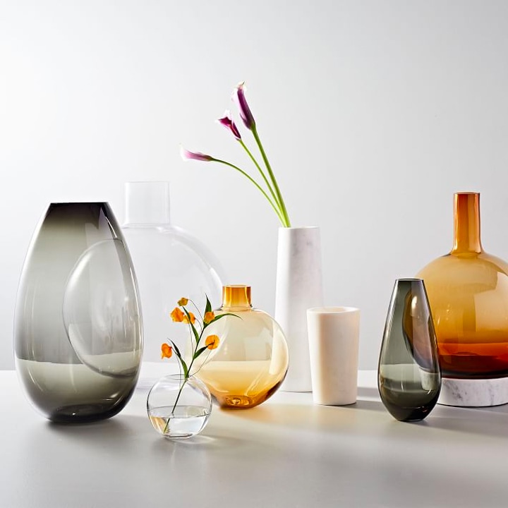 assortment of vases with plants