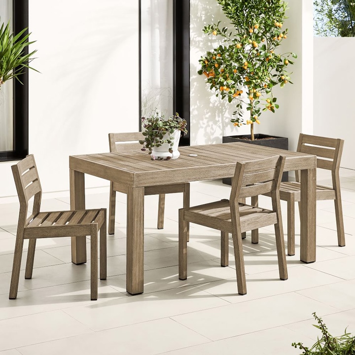 Outdoor wooden dining table and chairs.