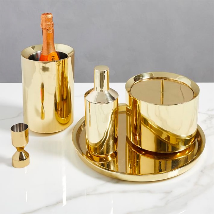 champagne served with gold barware