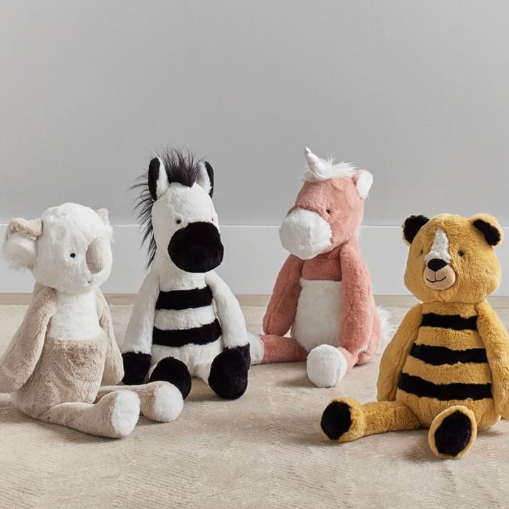 collection of stuffed animals sitting up