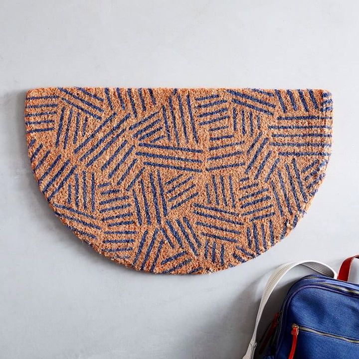 semi circle doormat with abstract pattern