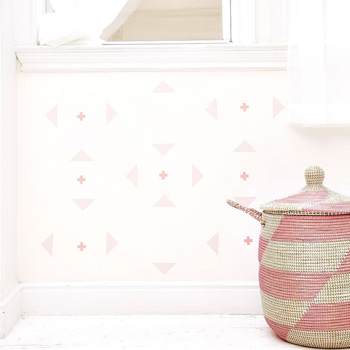 triangle wall stickers behind woven basket