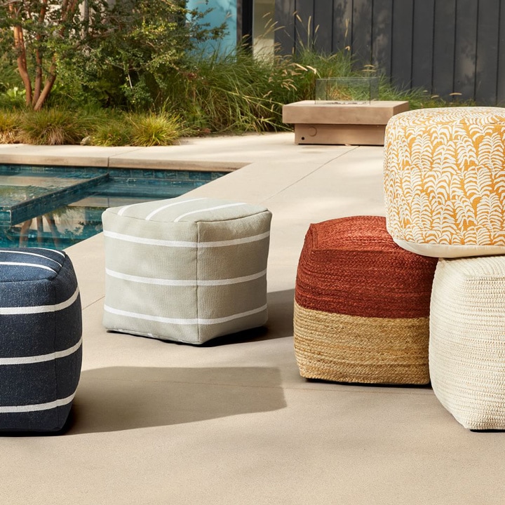 Outdoor poufs in various colors.